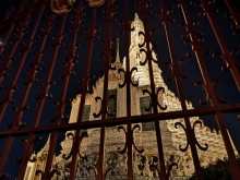 Wat Arun through a gate at night